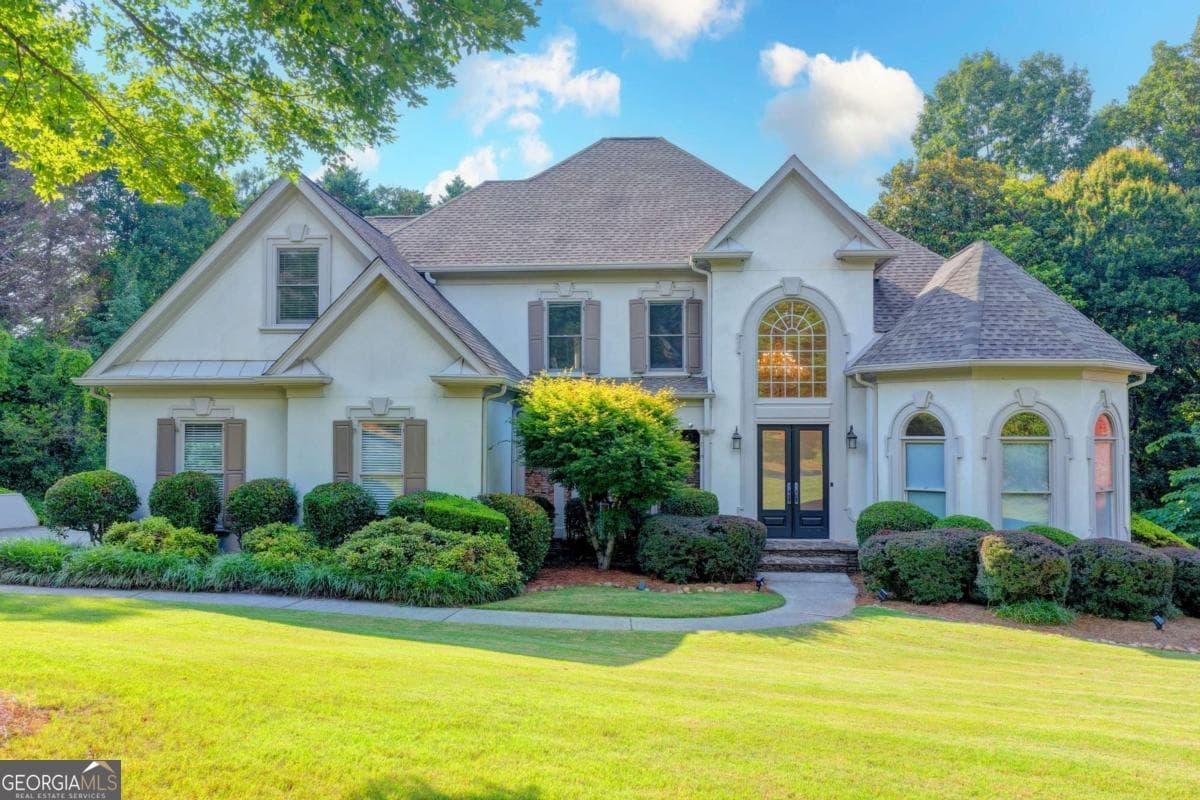 Laurel Springs · 5955 Ettington Drive, Suwanee GA 30024